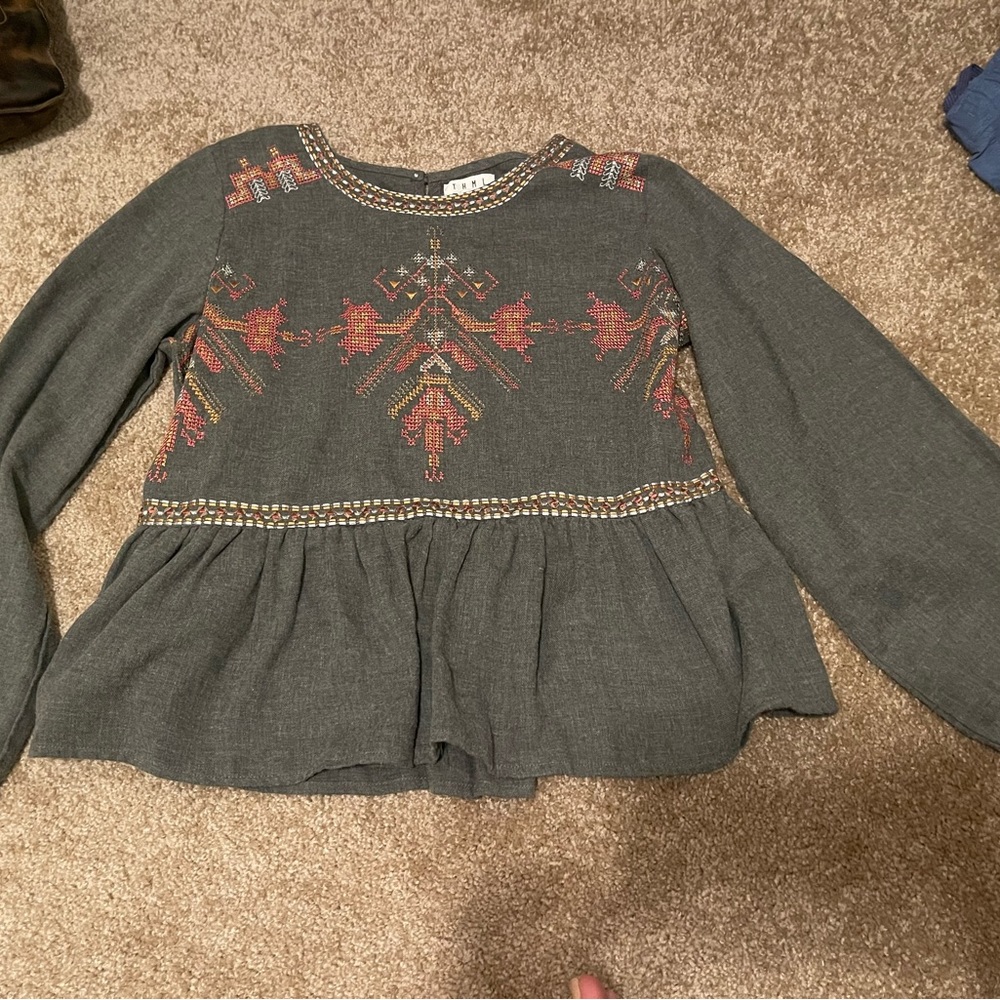 Women’s peplum top with beautiful embroidery design